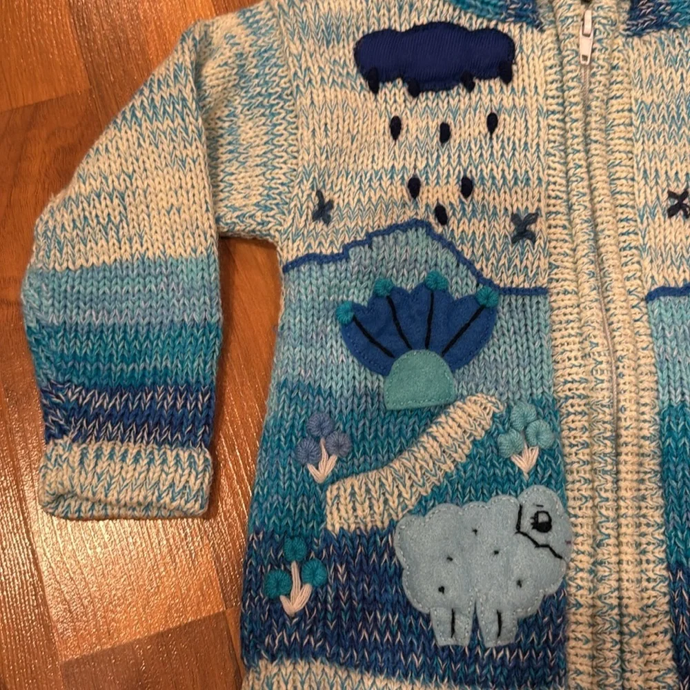 Handmade in Peru girls size 2 blue knit sweaterter with sewn on designs‎ knit
